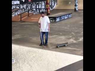 blind skater performs a kickflip