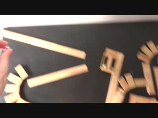 crazy tricks with pieces of wood, balls and rubber bands