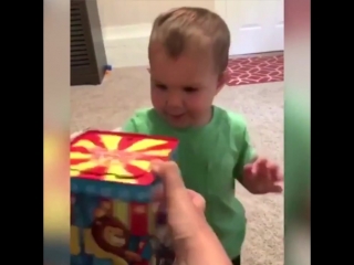 surprise in a box. teen's reaction