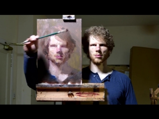 a talented artist creates a self-portrait