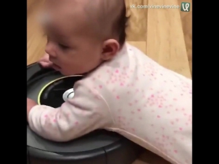 teen on a robotic vacuum cleaner