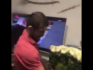 son gave mom a huge bouquet of flowers