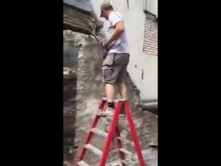 worker with the hammer turned off