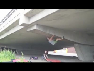 rock climbers against the bridge © video